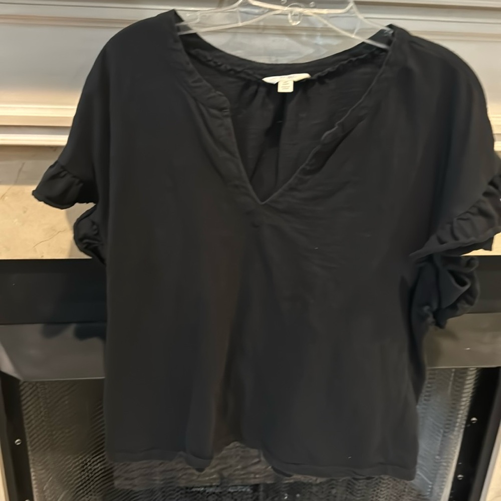 Size oX black knit top  worn several times. Listing # 679